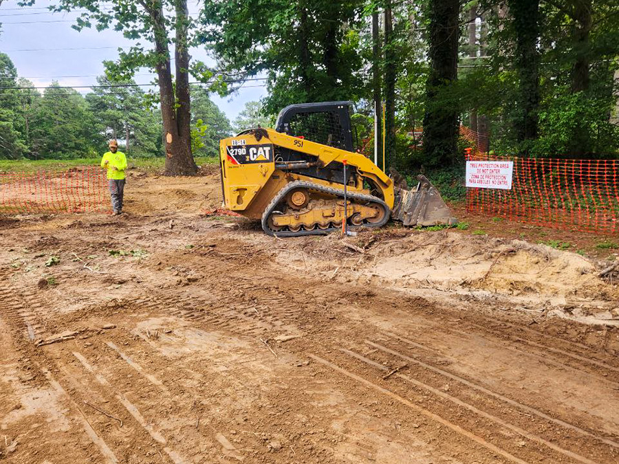 Compact track loader on a job site for East Coast Civil Group, a civil construction contractor based in Raleigh, NC.